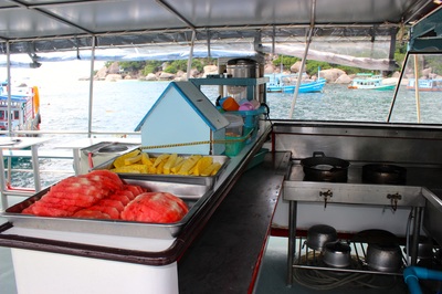 dive boat with fruit, water, coffee and tea