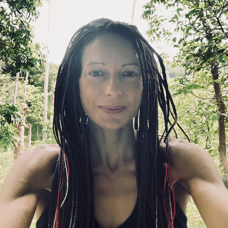 Koh tao yoga teacher standing in the jungle